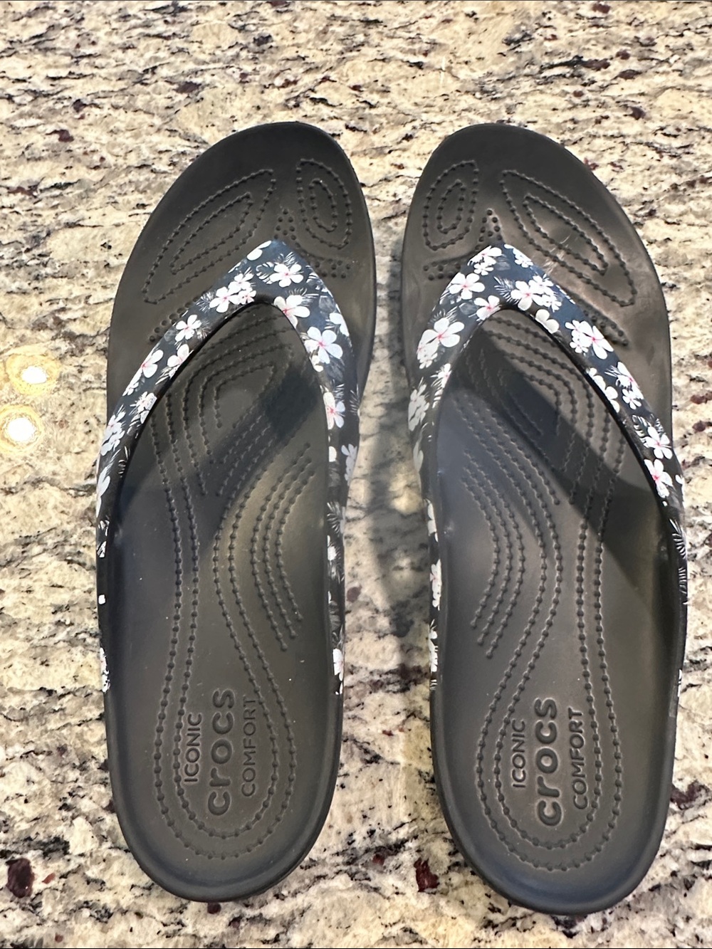 CROCS Women's Black Flip Sandals with White and Pink Floral Straps